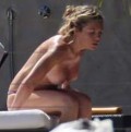 Abigail Clancy nude in Topless sunbathing