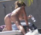 Abigail Clancy nude in Topless sunbathing
