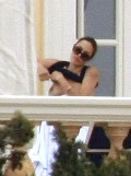Angelina Jolie nude in topless on  a balcony