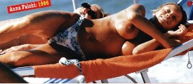 Anna Falchi nude in Topless sunbathing