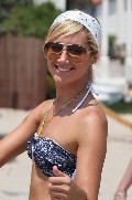 Ashley Tisdale in white bikini