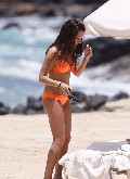 Ashley Tisdale in orange bikini