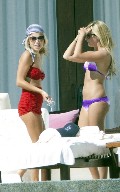 Ashley Tisdale in purple bikini