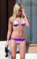 Ashley Tisdale in purple bikini