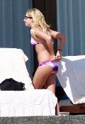 Ashley Tisdale in purple bikini