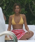 Beyonce Knowles in yellow bikini