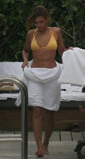 Beyonce Knowles in yellow bikini