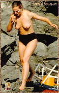 Carole Bouquet nude in Topless swimming