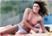 Claudia Ruffo nude in Topless sunbathing