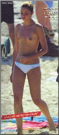 Dafne Fernández nude in topless at the beach