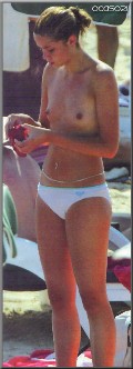 Dafne Fernández nude in topless at the beach