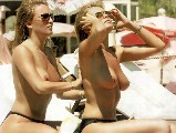 Dannielle Brent nude in Topless sunbathing
