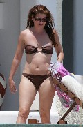 Debra Messing nude in Poolside Nip Slip
