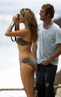 Delta Goodrem in gray bikini