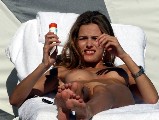 Edita Vilkeviciute nude in Topless sunbathing