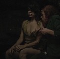 Eva Mendes nude in Holy Motors