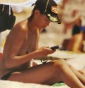 Fernanda Lessa nude in topless at the beach
