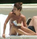 Helena Christensen nude in Topless sunbathing