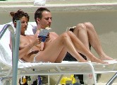 Helena Christensen nude in Topless sunbathing