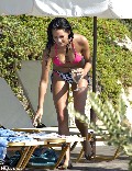 Jessica Jane Clement in purple bikini