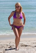 Jewel Kilcher in purple bikini