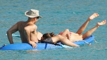 Kelly Brook nude in Topless swimming