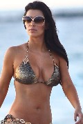 Kim Kardashian in gold bikini