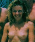Kylie Minogue nude in topless at the beach - young