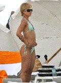 Mena Suvari in green bikini