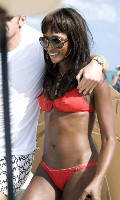 Naomi Campbell in red bikini