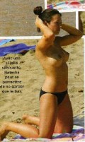 Natasha St-Pier nude in Topless sunbathing