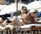 Oksana Andersson nude in Topless sunbathing
