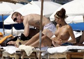 Oksana Andersson nude in Topless sunbathing