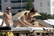 Oksana Andersson nude in Topless sunbathing