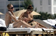 Oksana Andersson nude in Topless sunbathing