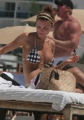 Oksana Andersson nude in Topless sunbathing