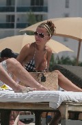 Oksana Andersson nude in Topless sunbathing