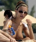 Oksana Andersson nude in Topless sunbathing