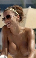 Oksana Andersson nude in Topless sunbathing
