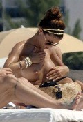 Oksana Andersson nude in Topless sunbathing