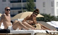 Oksana Andersson nude in Topless sunbathing