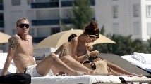 Oksana Andersson nude in Topless sunbathing