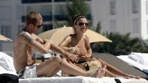 Oksana Andersson nude in Topless sunbathing