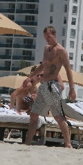 Oksana Andersson nude in Topless sunbathing