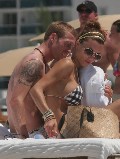 Oksana Andersson nude in Topless sunbathing