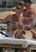 Oksana Andersson nude in Topless sunbathing