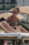 Oksana Andersson nude in Topless sunbathing