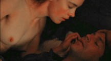 Olivia Williams nude in The Postman