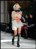 Pamela Anderson nude in Vivienne Westwood Fashion Show