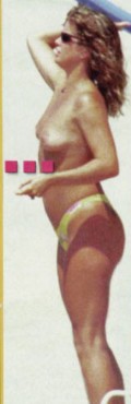 Rachel Hunter nude in topless at the beach